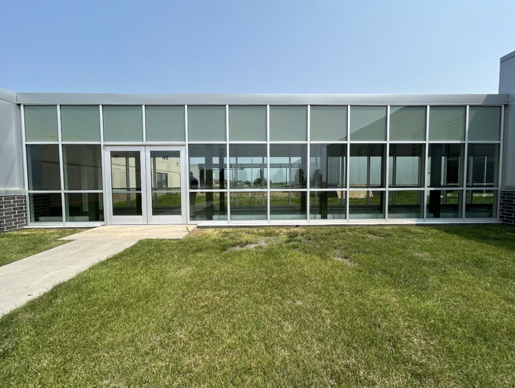 Blank glass entrance before window graphics