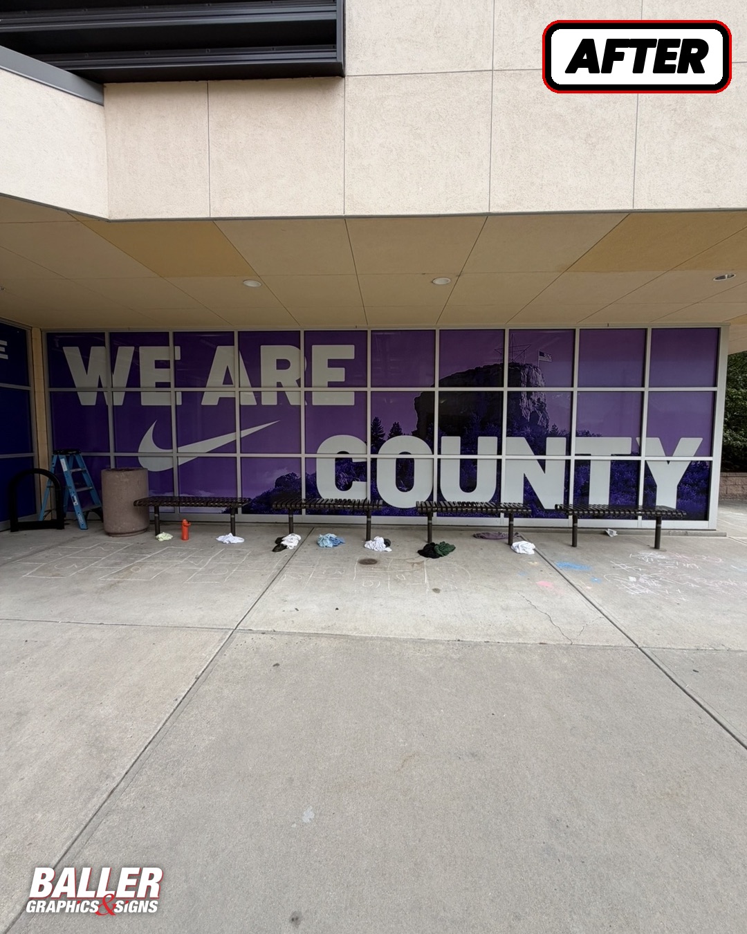 WE ARE COUNTY window graphic with Castle Rock landmark at Douglas County High School