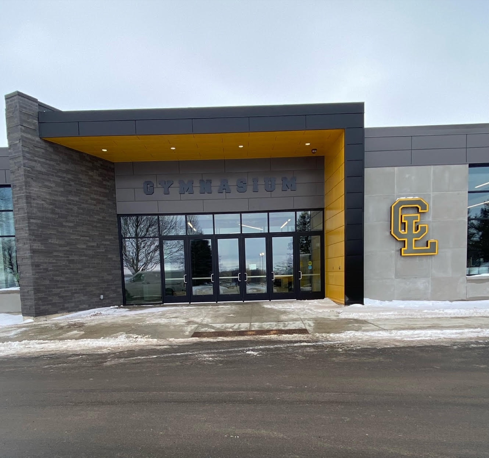 Clear Lake gymnasium exterior with dimensional CL monogram